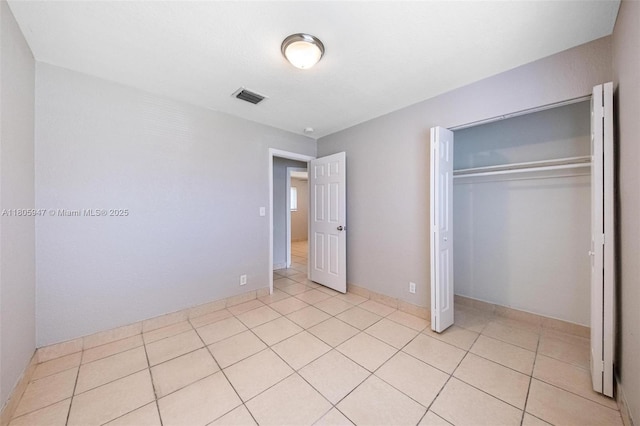 6871 SW 18th St, North Lauderdale, FL 33068 - unfurnished bedroom with a closet and light tile patterned floors