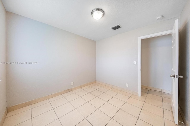 6871 SW 18th St, North Lauderdale, FL 33068 - spare room with light tile patterned floors and a smoke detector