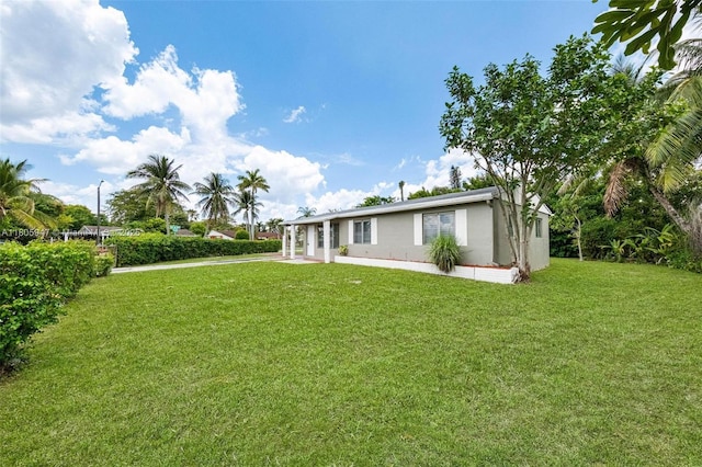 6871 SW 18th St, North Lauderdale, FL 33068 - view of green lawn featuring a patio area