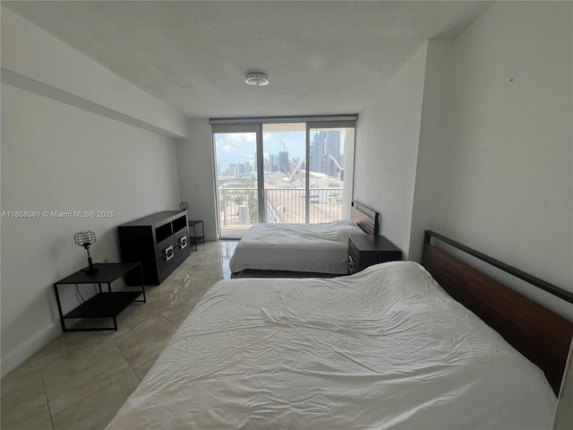 1750 N Bayshore Dr Unit 1410, Miami, FL 33132 - bedroom featuring access to outside, a city view, and a wall of windows