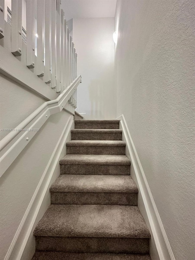 11965 NW 47th Mnr, Coral Springs, FL 33076 - stairs with a textured wall