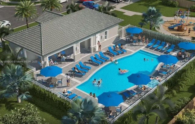 11965 NW 47th Mnr, Coral Springs, FL 33076 - view of swimming pool featuring a patio area