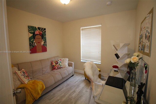 3045 SW 129th Way Unit 152, Miramar, FL 33027 - living room with wood finished floors and baseboards
