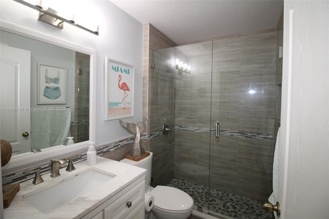 3045 SW 129th Way Unit 152, Miramar, FL 33027 - bathroom featuring vanity, a shower stall, toilet, and tile walls