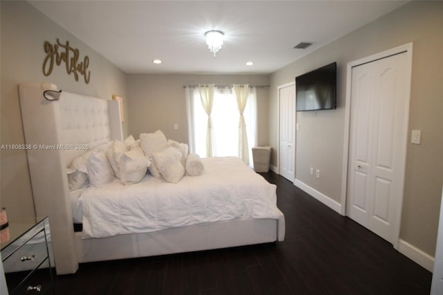 3045 SW 129th Way Unit 152, Miramar, FL 33027 - bedroom with dark wood-style floors, baseboards, recessed lighting, and multiple closets