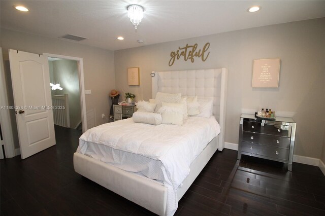 3045 SW 129th Way Unit 152, Miramar, FL 33027 - bedroom with wood finished floors, recessed lighting, and baseboards