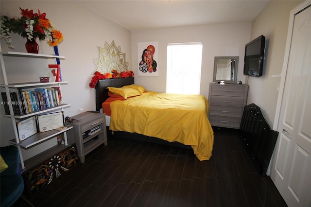 3045 SW 129th Way Unit 152, Miramar, FL 33027 - bedroom featuring dark wood-style flooring