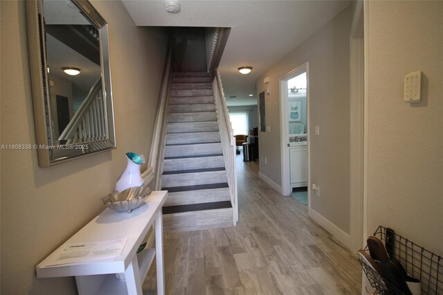 3045 SW 129th Way Unit 152, Miramar, FL 33027 - stairs featuring wood finished floors and baseboards