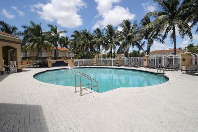 3045 SW 129th Way Unit 152, Miramar, FL 33027 - community pool with a patio area