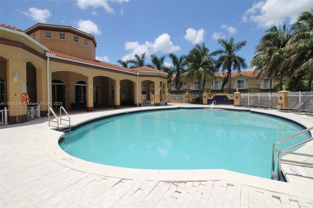 3045 SW 129th Way Unit 152, Miramar, FL 33027 - community pool featuring a patio area