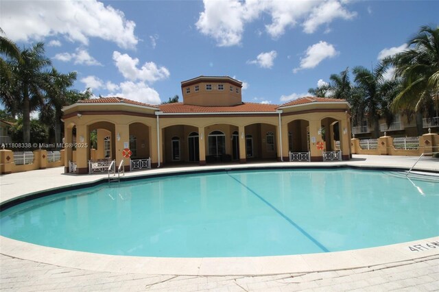 3045 SW 129th Way Unit 152, Miramar, FL 33027 - community pool featuring a patio