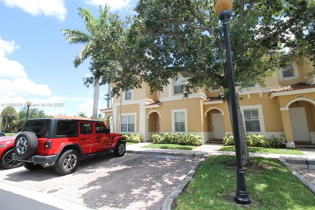 3045 SW 129th Way Unit 152, Miramar, FL 33027 - multi unit property featuring stucco siding and uncovered parking