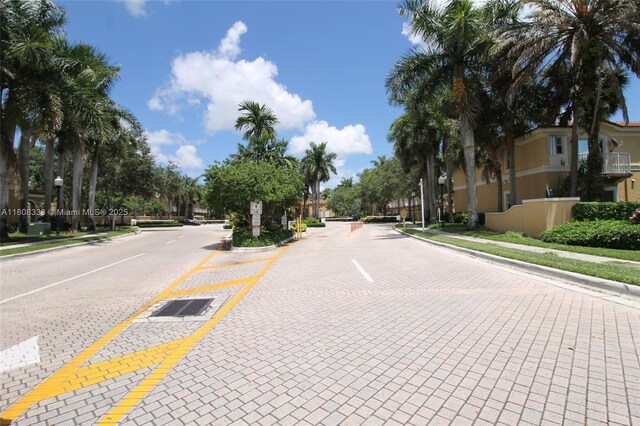 3045 SW 129th Way Unit 152, Miramar, FL 33027 - view of road with curbs, sidewalks, and street lighting
