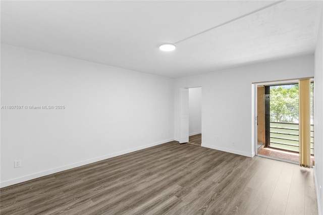 3591 Inverrary Dr Unit 203, Lauderhill, FL 33319 - unfurnished room featuring wood finished floors and baseboards