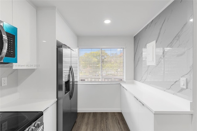 3591 Inverrary Dr Unit 203, Lauderhill, FL 33319 - kitchen with appliances with stainless steel finishes, dark wood-style floors, white cabinets, light countertops, and recessed lighting