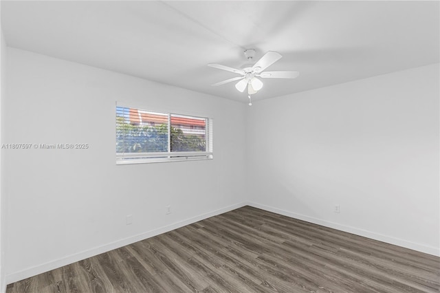 3591 Inverrary Dr Unit 203, Lauderhill, FL 33319 - empty room featuring dark wood-type flooring, baseboards, and a ceiling fan