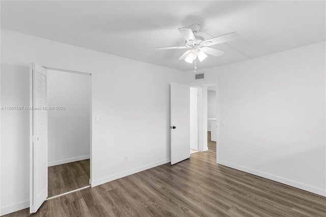 3591 Inverrary Dr Unit 203, Lauderhill, FL 33319 - unfurnished bedroom featuring wood finished floors, baseboards, and ceiling fan