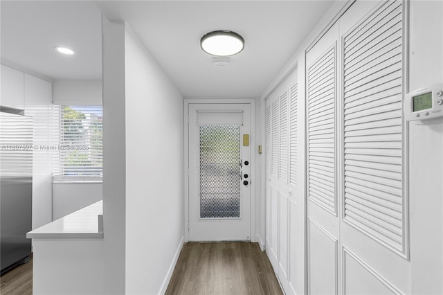 3591 Inverrary Dr Unit 203, Lauderhill, FL 33319 - corridor with dark wood-type flooring, baseboards, and recessed lighting