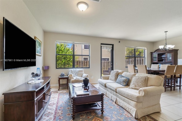 9618 Waterview Way, Parkland, FL 33076 - living area featuring a chandelier, light tile patterned floors, and baseboards