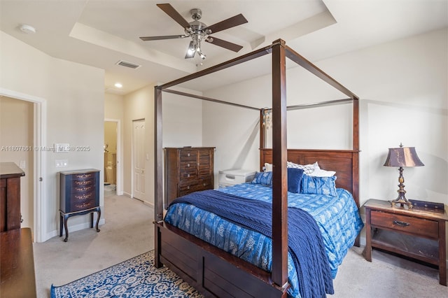 9618 Waterview Way, Parkland, FL 33076 - bedroom with light colored carpet, a closet, a tray ceiling, and ceiling fan