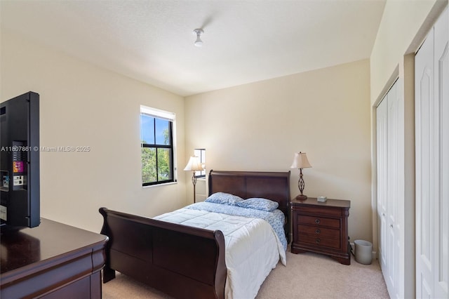 9618 Waterview Way, Parkland, FL 33076 - bedroom featuring light carpet and a closet