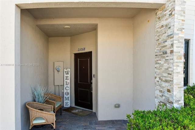 21068 NE 8th Ave, Miami, FL 33179 - property entrance featuring stucco siding