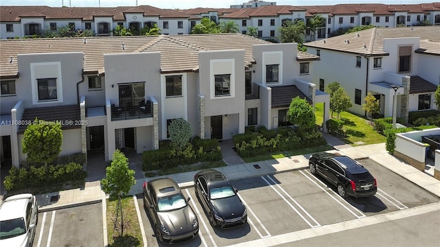 21068 NE 8th Ave, Miami, FL 33179 - view of building exterior with uncovered parking and a residential view