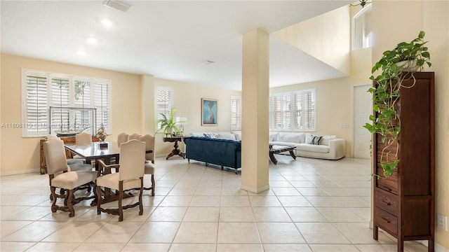 3945 Heron Ridge Ln, Weston, FL 33331 - dining space featuring light tile patterned floors and baseboards