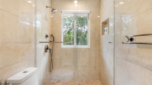 3945 Heron Ridge Ln, Weston, FL 33331 - full bathroom with a tile shower, toilet, and plenty of natural light