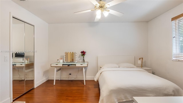 3945 Heron Ridge Ln, Weston, FL 33331 - bedroom featuring wood finished floors, ceiling fan, and baseboards