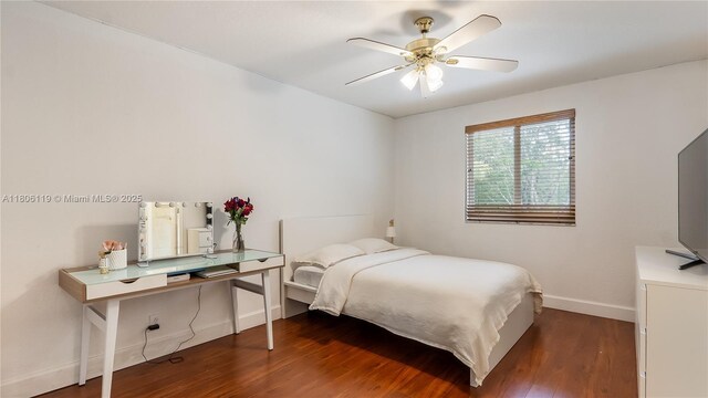 3945 Heron Ridge Ln, Weston, FL 33331 - bedroom featuring baseboards and wood finished floors
