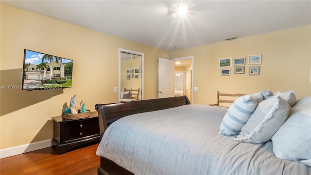 3945 Heron Ridge Ln, Weston, FL 33331 - bedroom with wood finished floors and baseboards