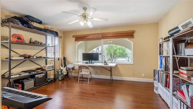 3945 Heron Ridge Ln, Weston, FL 33331 - home office with wood finished floors, a ceiling fan, and baseboards
