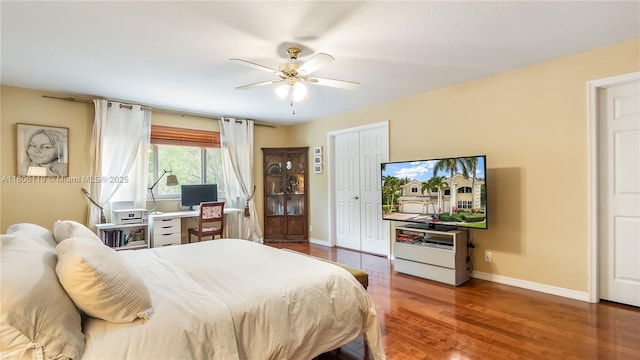 3945 Heron Ridge Ln, Weston, FL 33331 - bedroom with baseboards, wood finished floors, and ceiling fan
