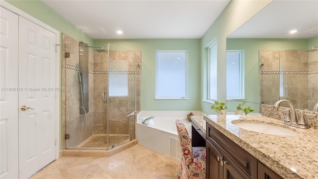 3945 Heron Ridge Ln, Weston, FL 33331 - bathroom with vanity, a bath, a stall shower, recessed lighting, and tile patterned flooring