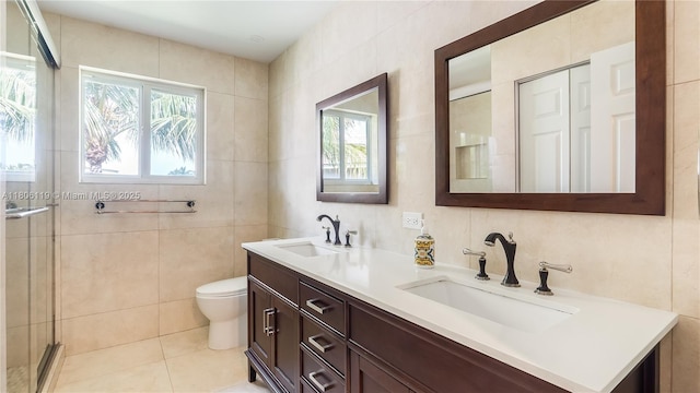 3945 Heron Ridge Ln, Weston, FL 33331 - full bath with double vanity, tile walls, a stall shower, toilet, and plenty of natural light