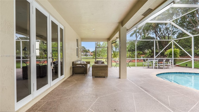 3945 Heron Ridge Ln, Weston, FL 33331 - swimming pool with french doors, a patio, and glass enclosure