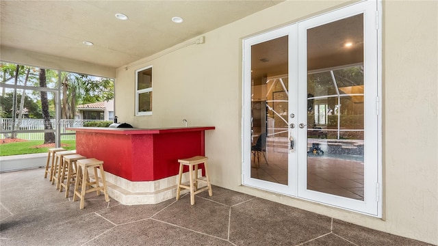 3945 Heron Ridge Ln, Weston, FL 33331 - view of patio featuring french doors