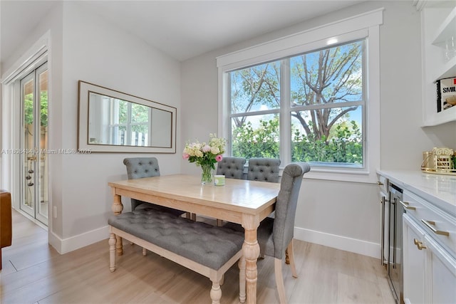 12480 SW 125th Ter, Miami, FL 33186 - dining area featuring light wood finished floors, baseboards, and plenty of natural light