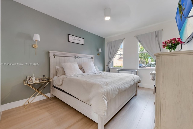 12480 SW 125th Ter, Miami, FL 33186 - bedroom featuring light wood-style flooring and baseboards