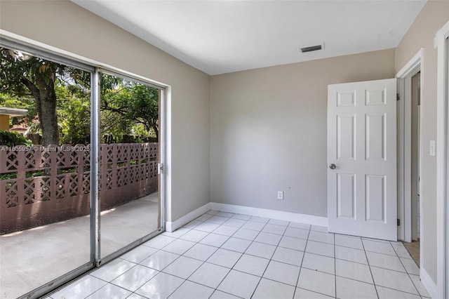 4960 NW 11th Ct, Lauderhill, FL 33313 - spare room with light tile patterned floors and baseboards