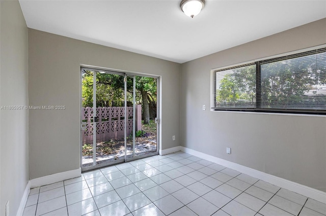 4960 NW 11th Ct, Lauderhill, FL 33313 - unfurnished room with light tile patterned floors and baseboards