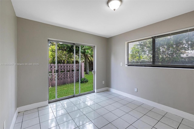 4960 NW 11th Ct, Lauderhill, FL 33313 - spare room featuring light tile patterned floors and baseboards
