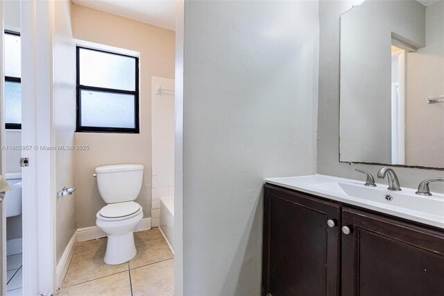 4960 NW 11th Ct, Lauderhill, FL 33313 - full bath with toilet, vanity, tile patterned floors, and  shower combination