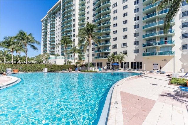 19390 Collins Ave Unit 217, Sunny Isles Beach, FL 33160 - community pool with a patio area