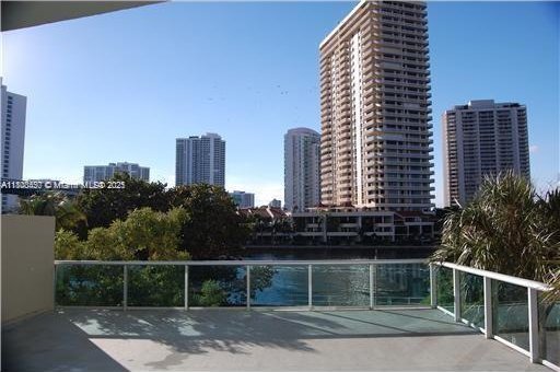 19390 Collins Ave Unit 217, Sunny Isles Beach, FL 33160 - view of patio / terrace with a city view
