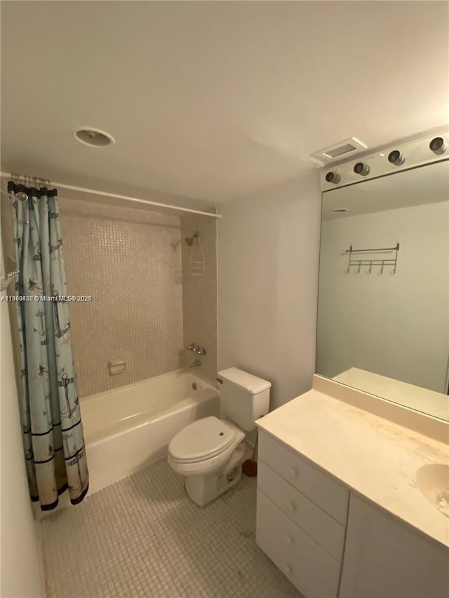 19390 Collins Ave Unit 217, Sunny Isles Beach, FL 33160 - bathroom with shower / bath combo with shower curtain, vanity, toilet, and tile patterned flooring