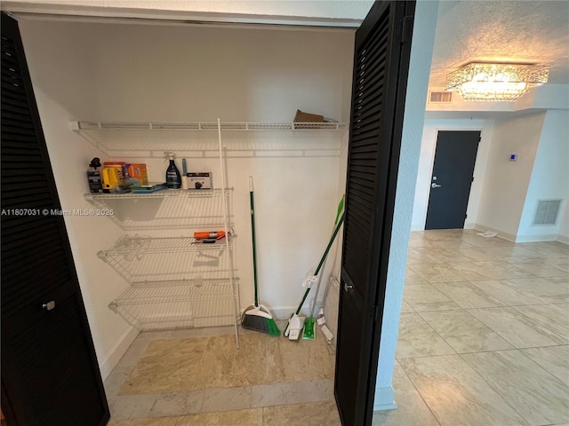 7501 E Treasure Dr Unit 9D, North Bay Village, FL 33141 - laundry area with baseboards