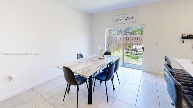 16233 SW 290th Ter, Homestead, FL 33033 - dining space featuring baseboards and light tile patterned floors