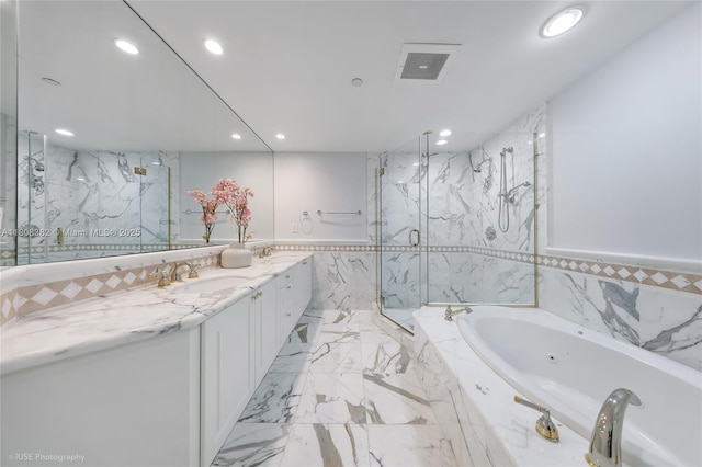 10225 Collins Ave Unit 604, Bal Harbour, FL 33154 - bathroom with recessed lighting, a jetted tub, a marble finish shower, double vanity, and marble finish flooring